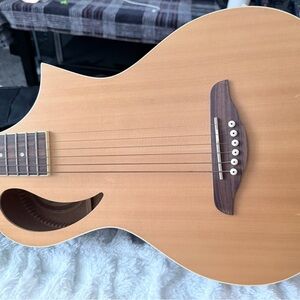 Acoustic Guitar with Unique Soundhole Design